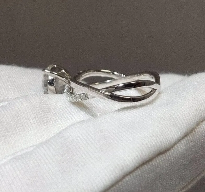 1 Carat Round Cut Diamond Twist 4 Claws Engagement Ring