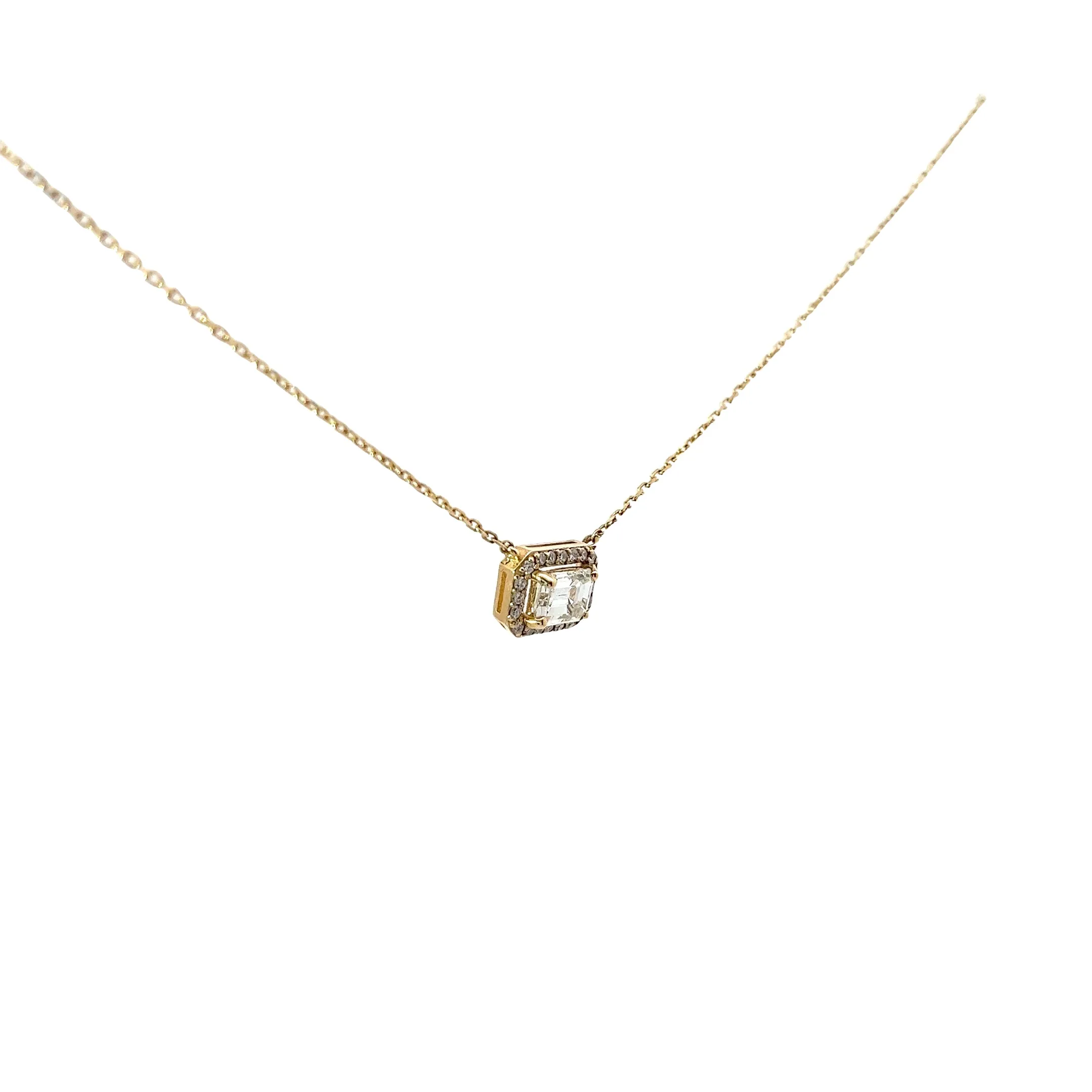 14k Yellow Gold .87ct H VS2 Emerald Cut Diamond and along a Halo .14ct H VS2 Round Diamond Solitaire Necklace