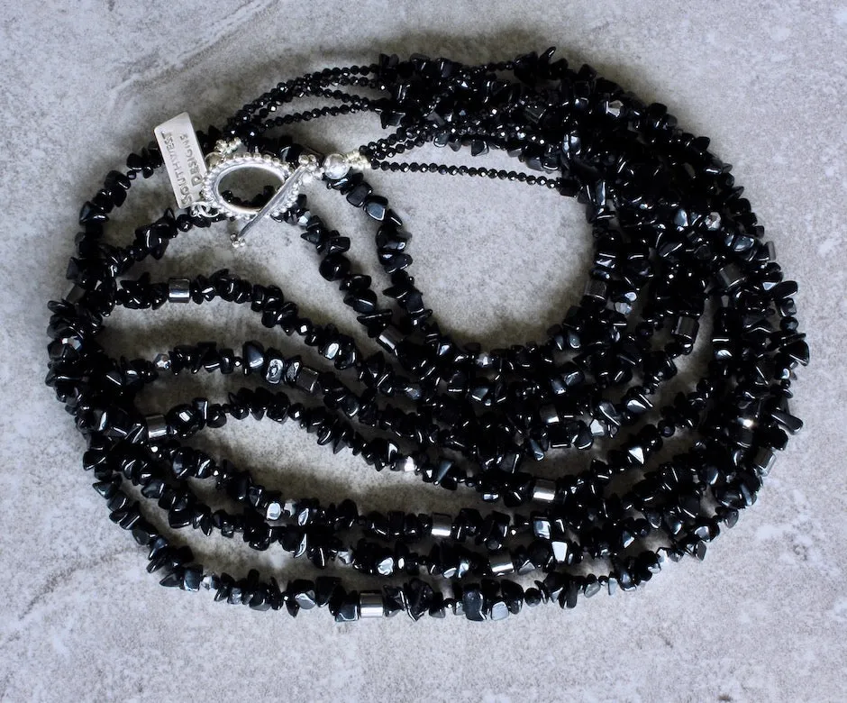 Black Onyx Chip 4-Strand Necklace with Hematite, Crystal, Czechoslovakian Nailheads and a Sterling Silver Toggle Clasp