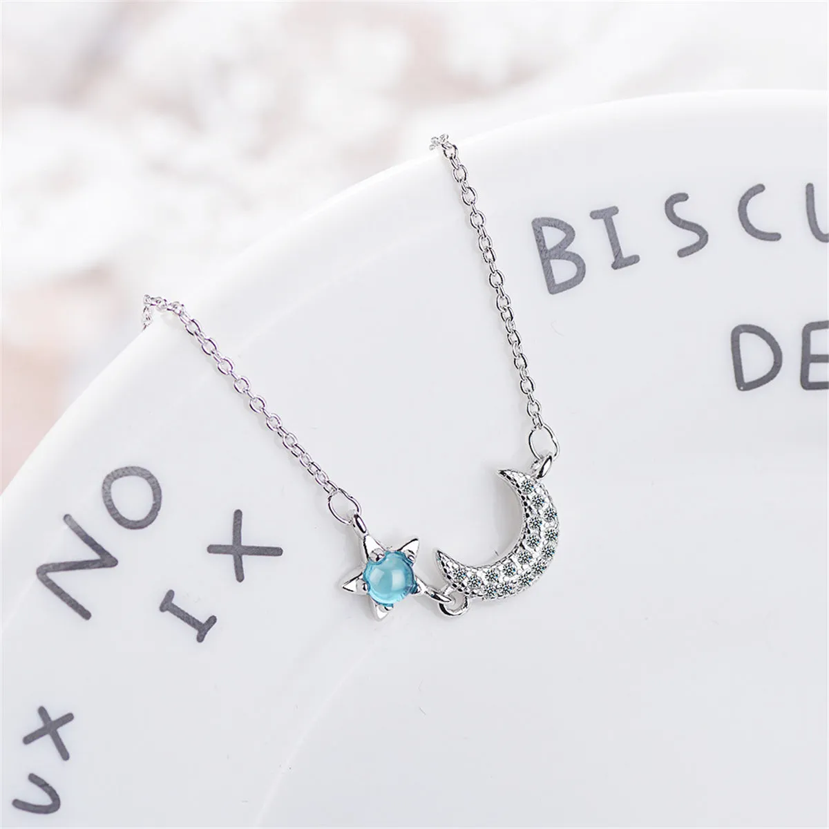 Blue Crystal & Cubic Zirconia Star & Moon Pendant Necklace