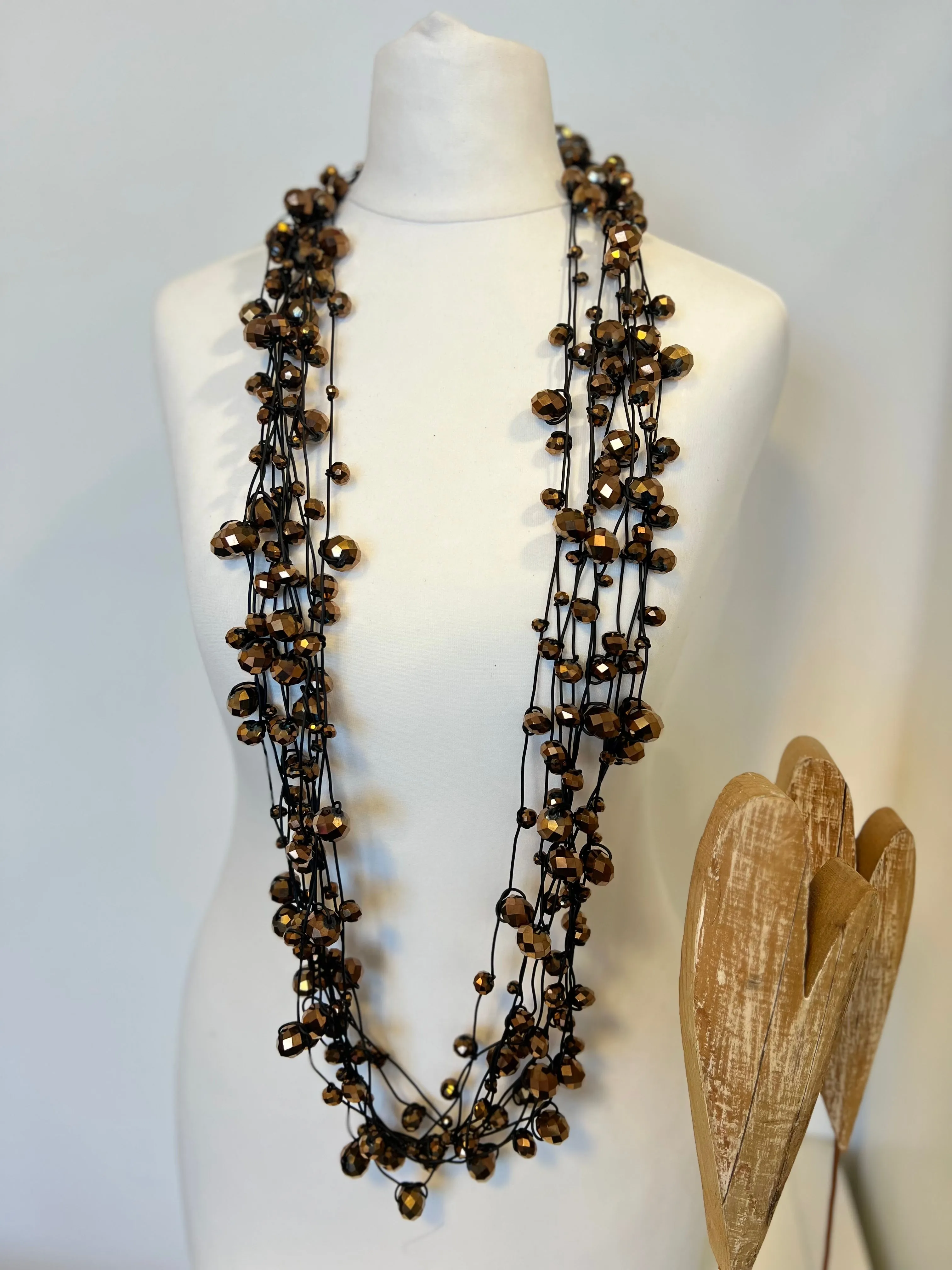 Crystal Faceted Beads on Rubber Necklace - Transparent Red