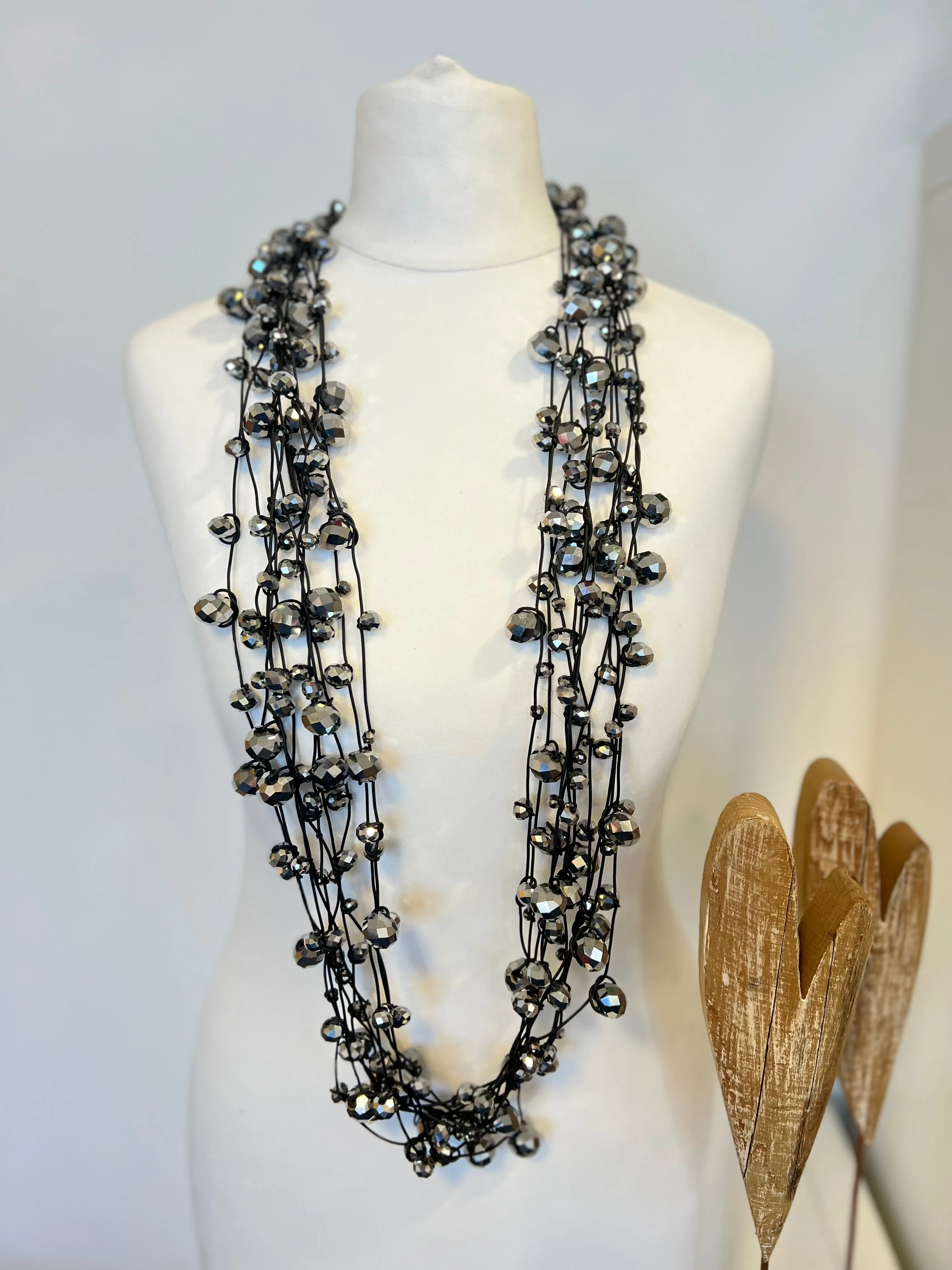Crystal Faceted Beads on Rubber Necklace - Transparent Red