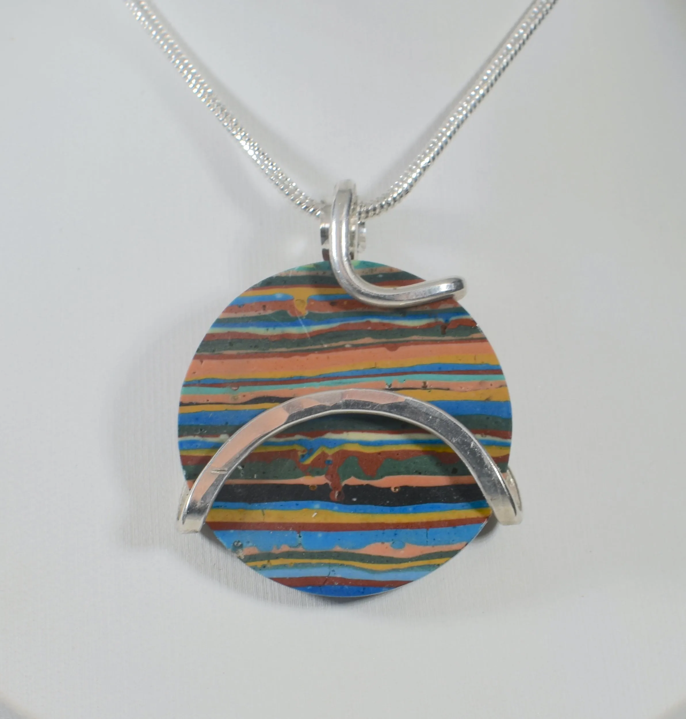 Fordite Handmade Stone Pendant Wrapped in Silver