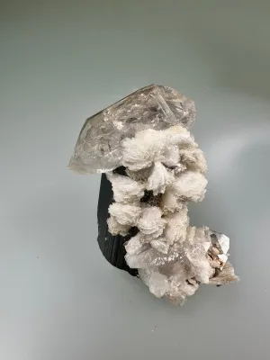 Quartz and Albite on Elbaite, Gilgit, Pakistan, Mined c. 1990s, ex. WIlliam Mickols Collection, Miniature, 2.5 x 4 x 5 cm, $50. Online Oct. 9.