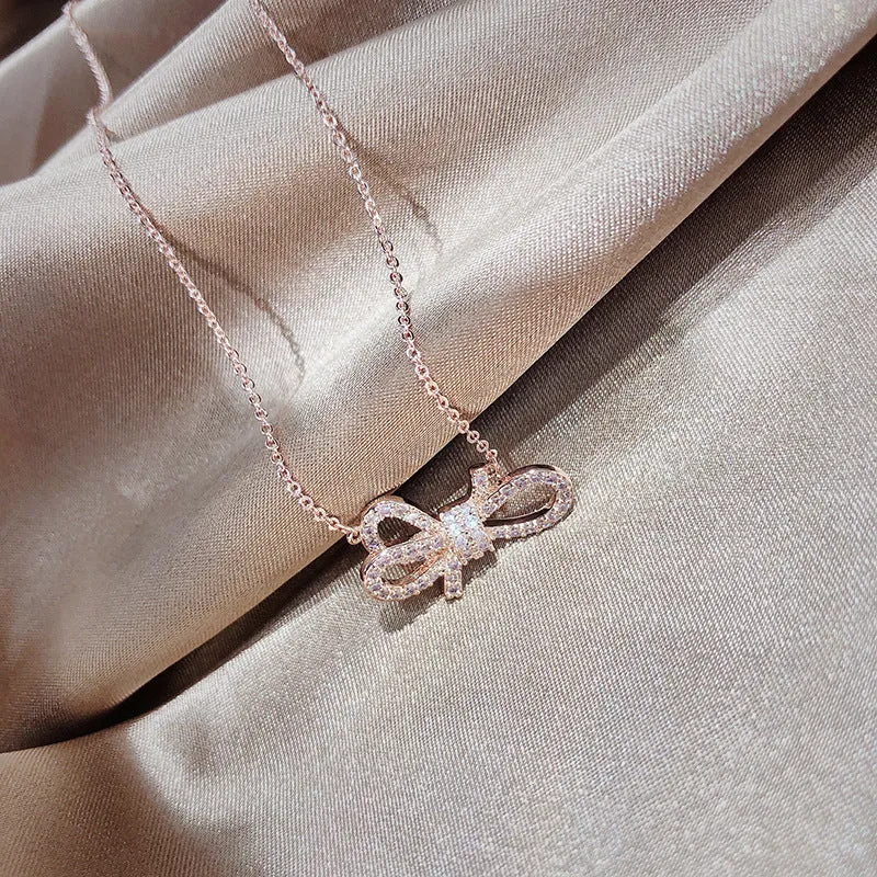 Rosegold Plated Design of Ribbon Pendant