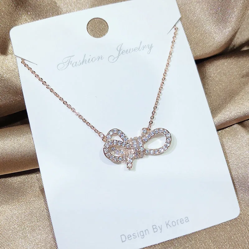 Rosegold Plated Design of Ribbon Pendant