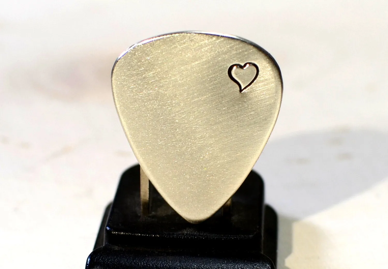 Sterling silver guitar pick with love and a heart