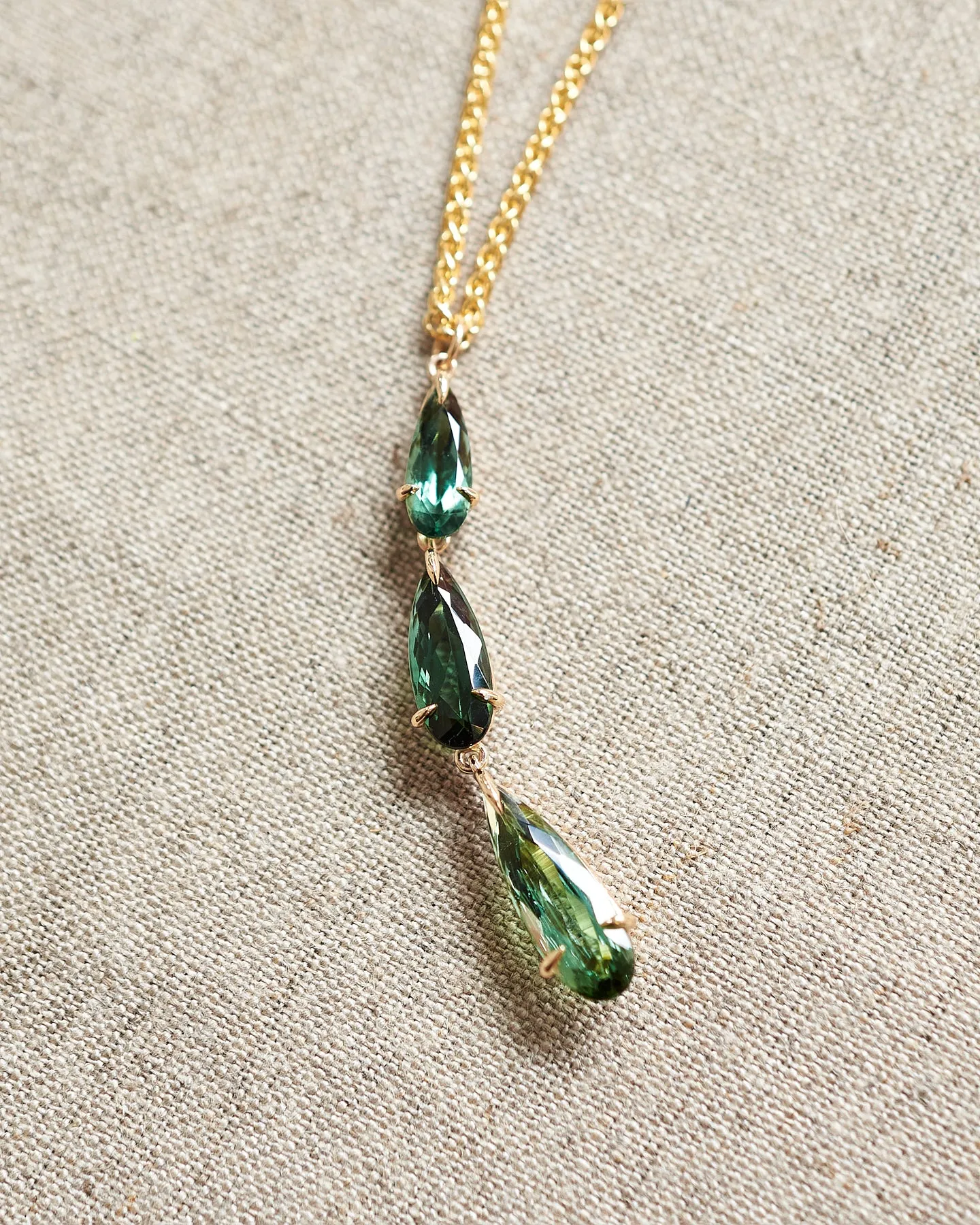Triple green tourmaline, tear drop pendant