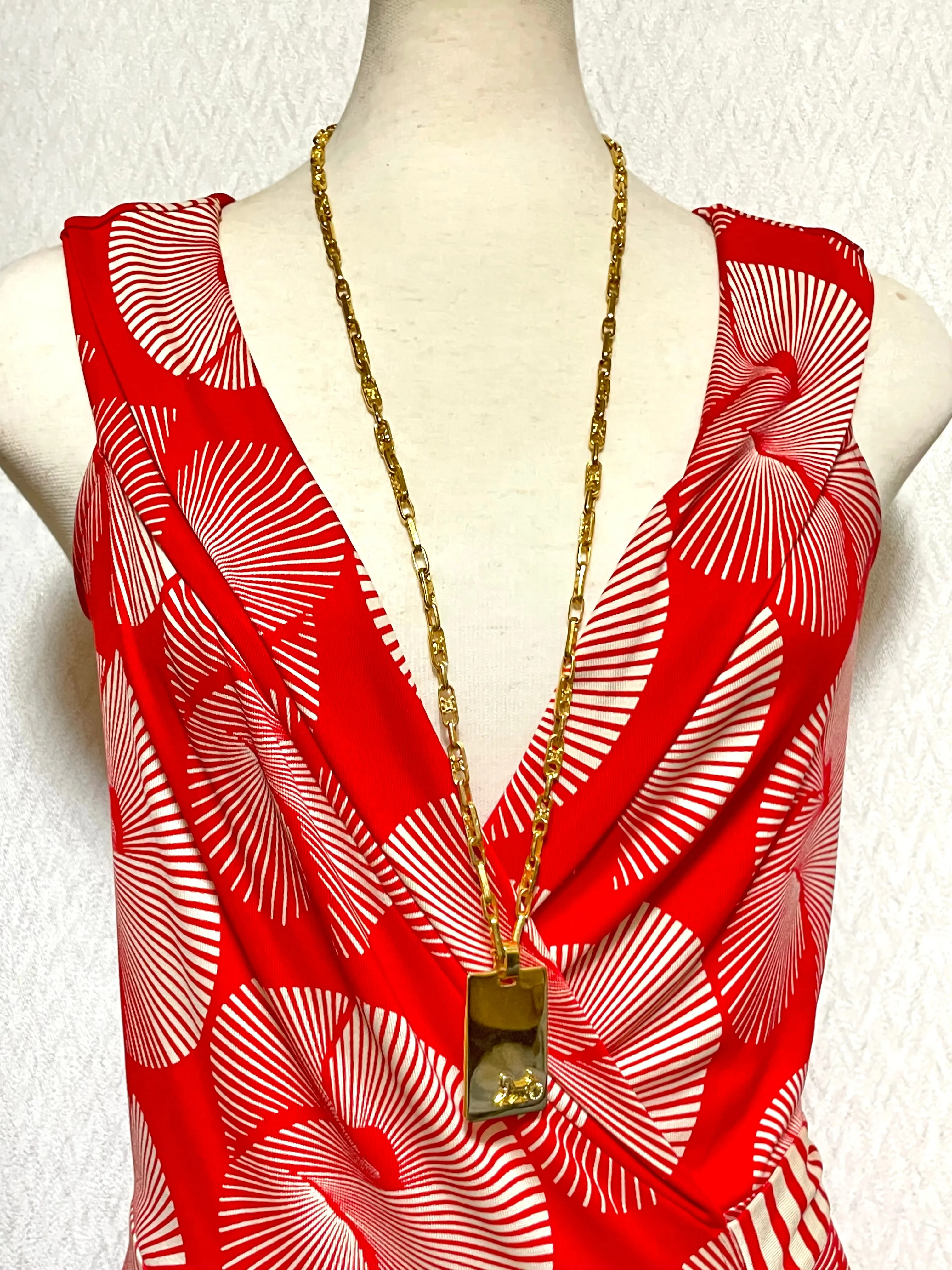Vintage Celine golden long necklace with blaison macadam charms and square plate with embossed logo and carriage. 041032