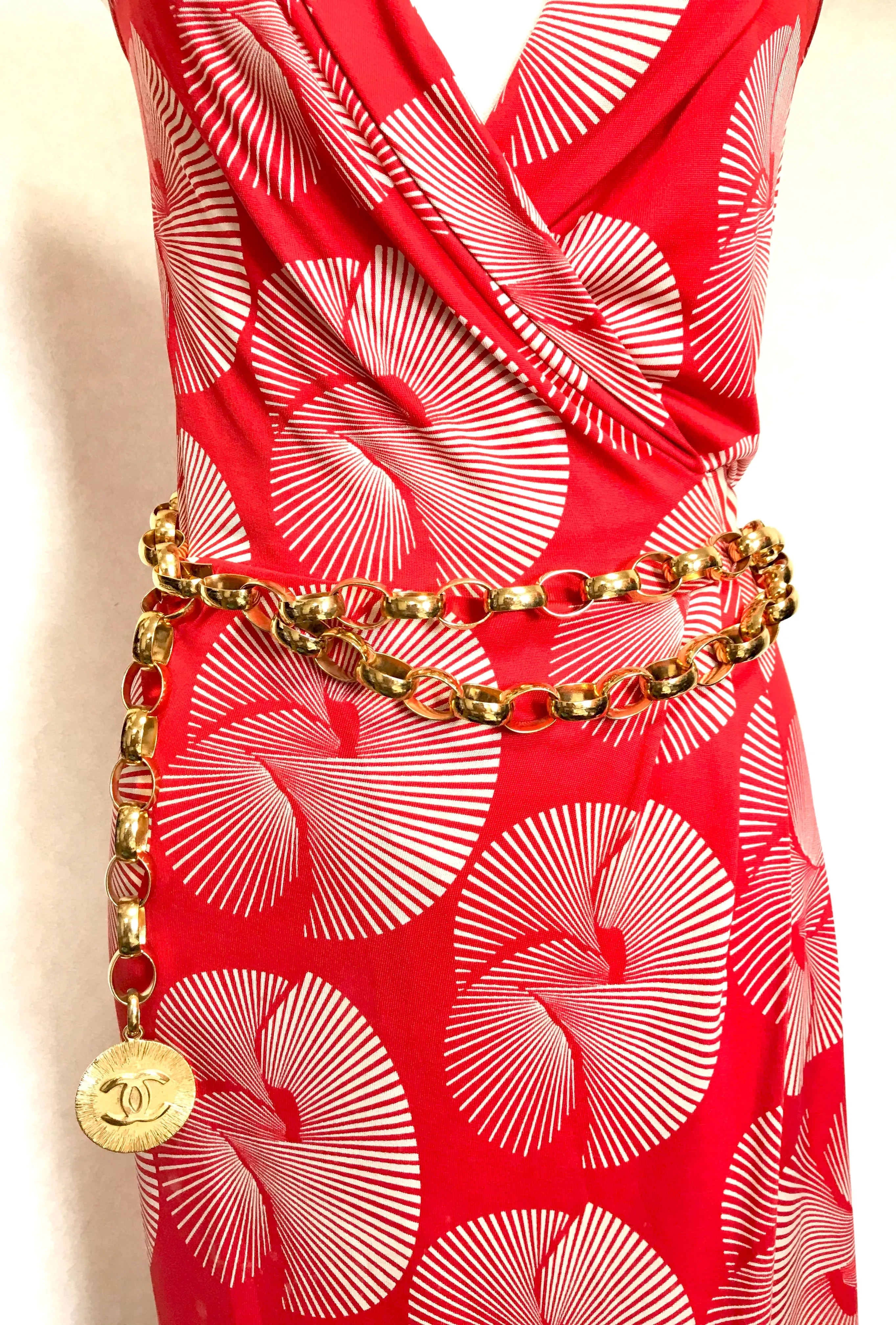 Vintage CHANEL golden chain belt with large CC motif charm. Nice and heavy, rare and gorgeous accessory. 050323re3