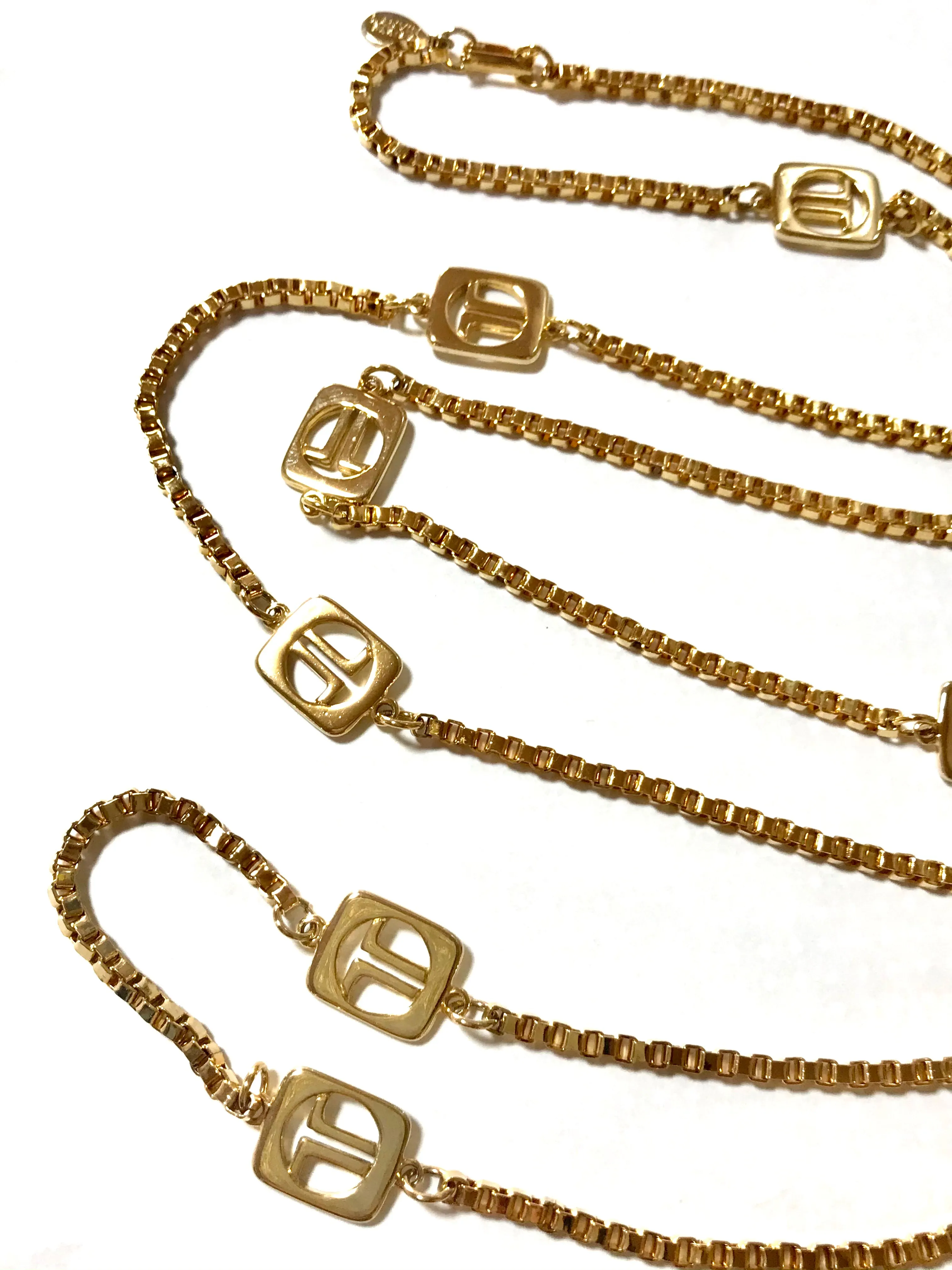 Vintage Lanvin golden chain long necklace with logo motif charms. Rare Lanvin vintage jewelry. Long necklace. 0403311