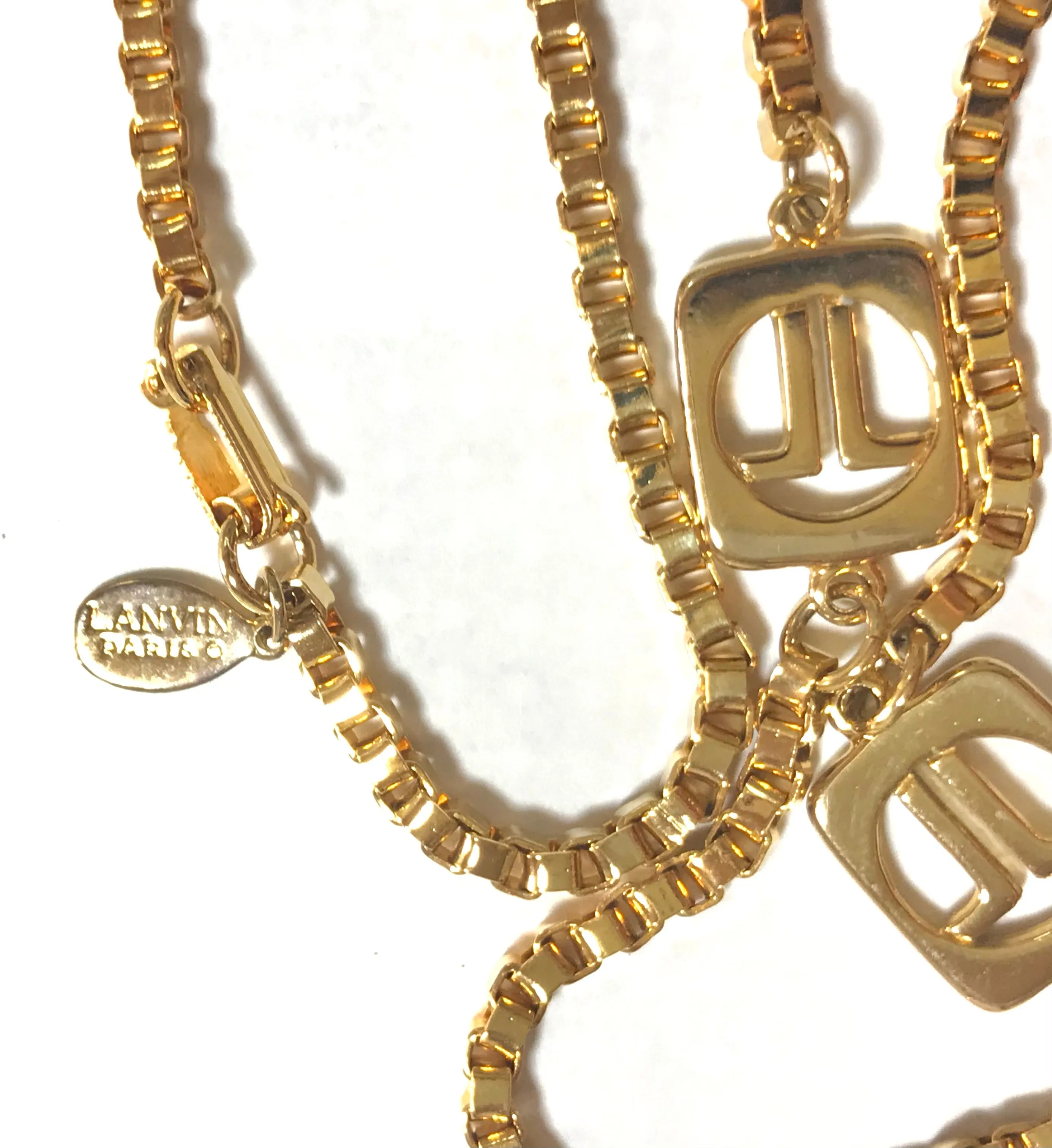 Vintage Lanvin golden chain long necklace with logo motif charms. Rare Lanvin vintage jewelry. Long necklace. 0403311