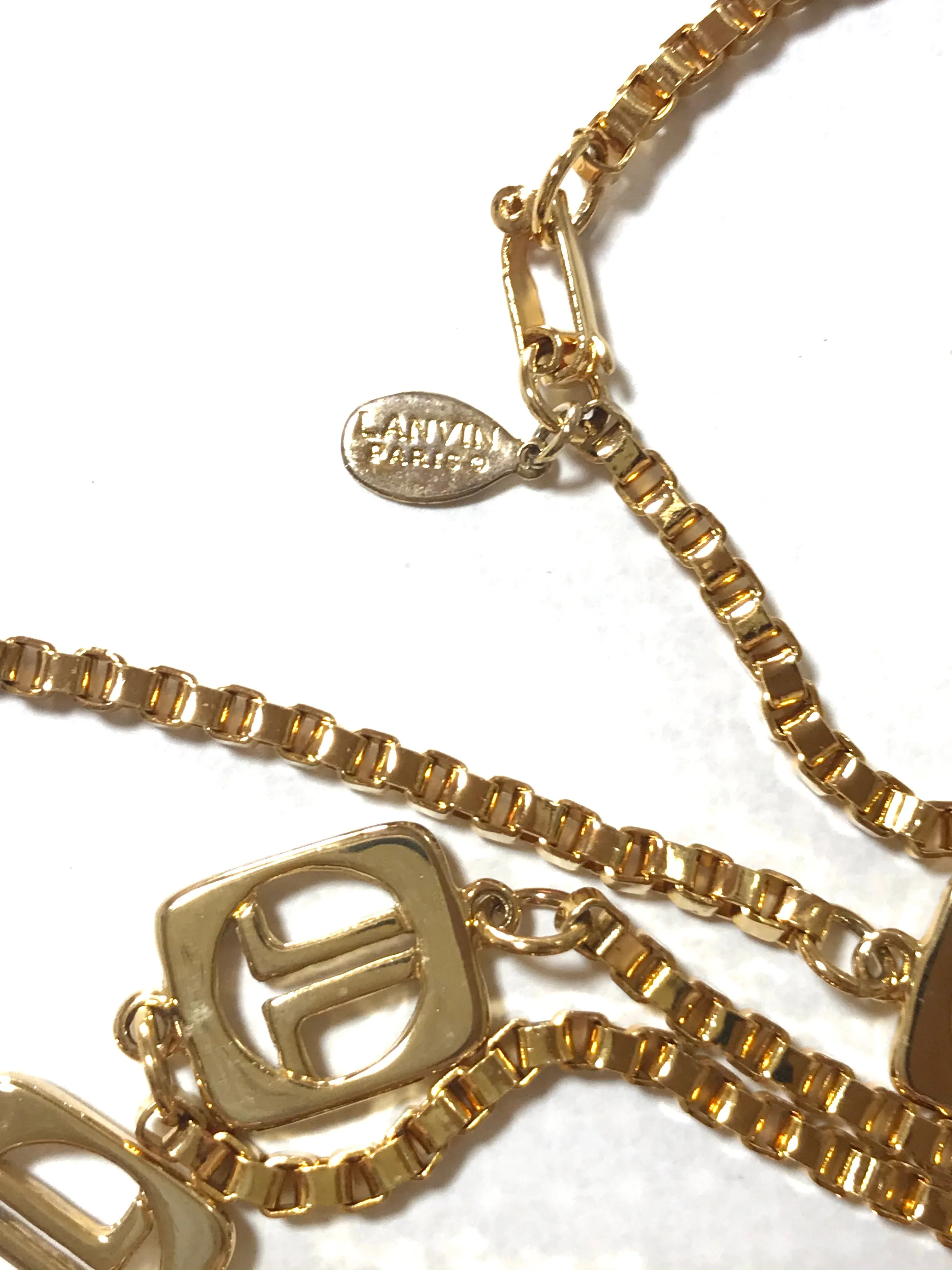 Vintage Lanvin golden chain long necklace with logo motif charms. Rare Lanvin vintage jewelry. Long necklace. 0403311